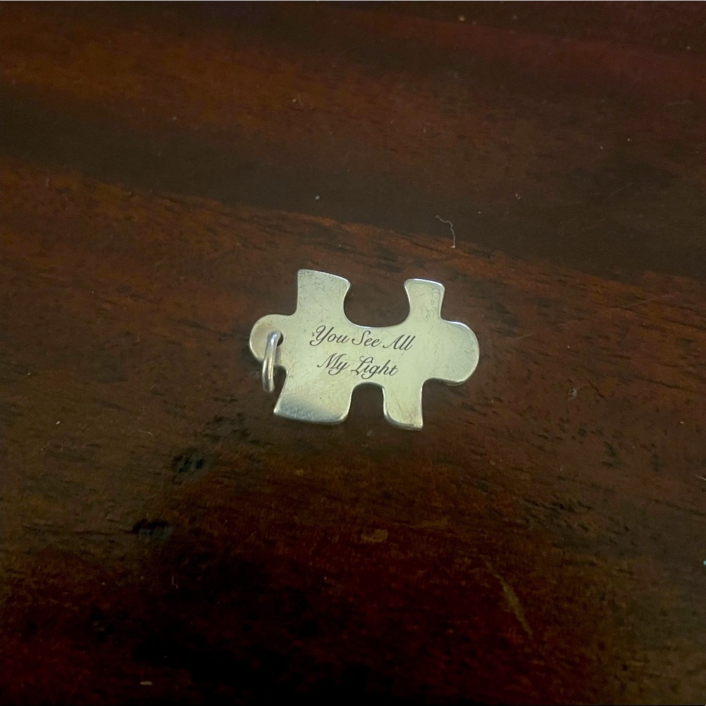 James avery puzzle piece charm